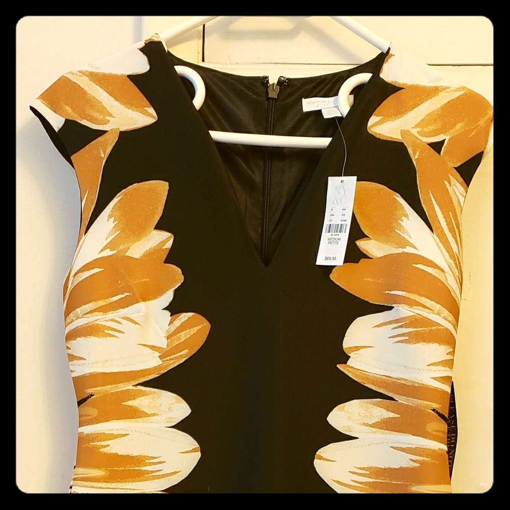 Black and gold sleeveless dress